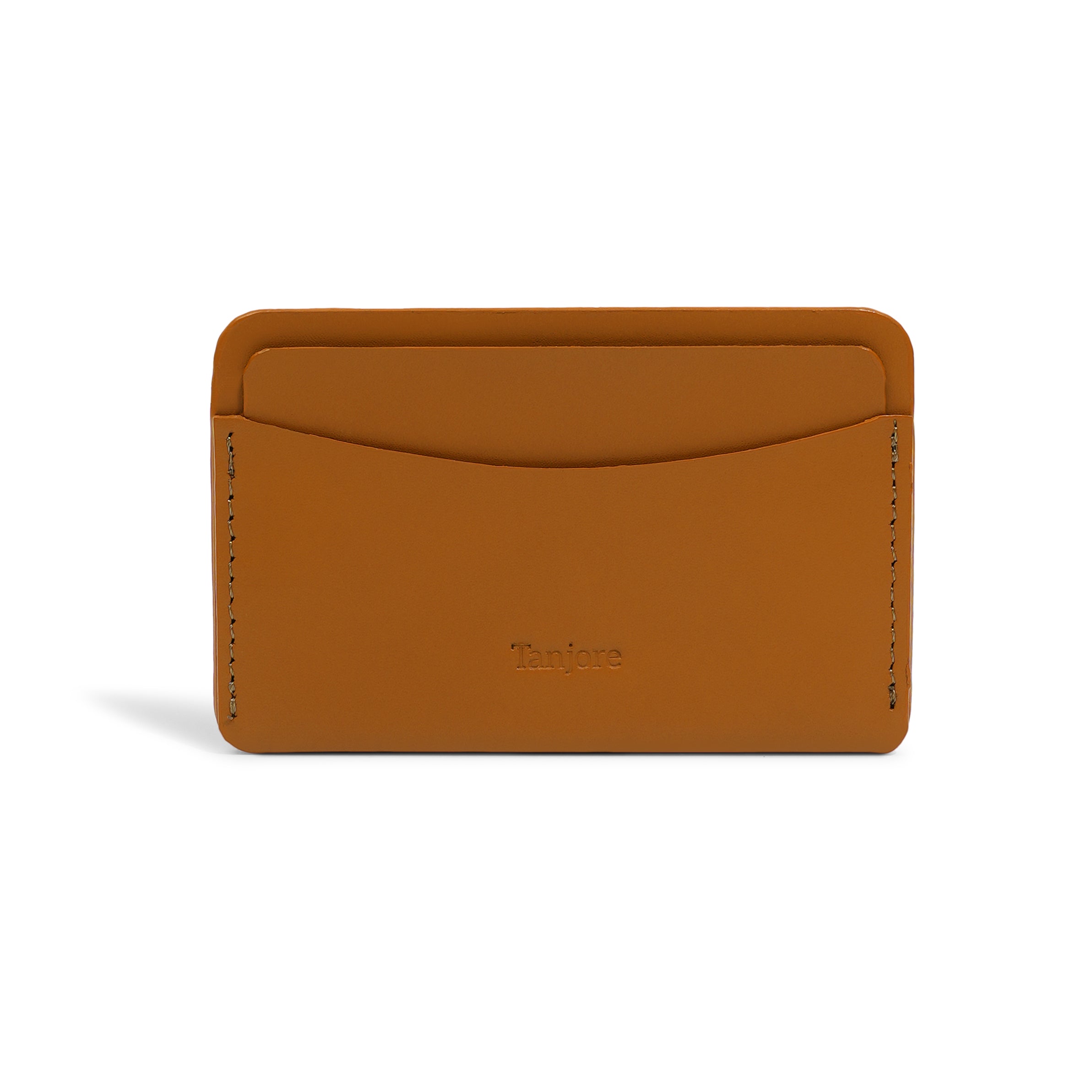 Front view of the minimalist Tanjore wallet in classic Tan. Crafted from premium Full Grain Nappa Leather with a 3 year warranty and embossed logo.