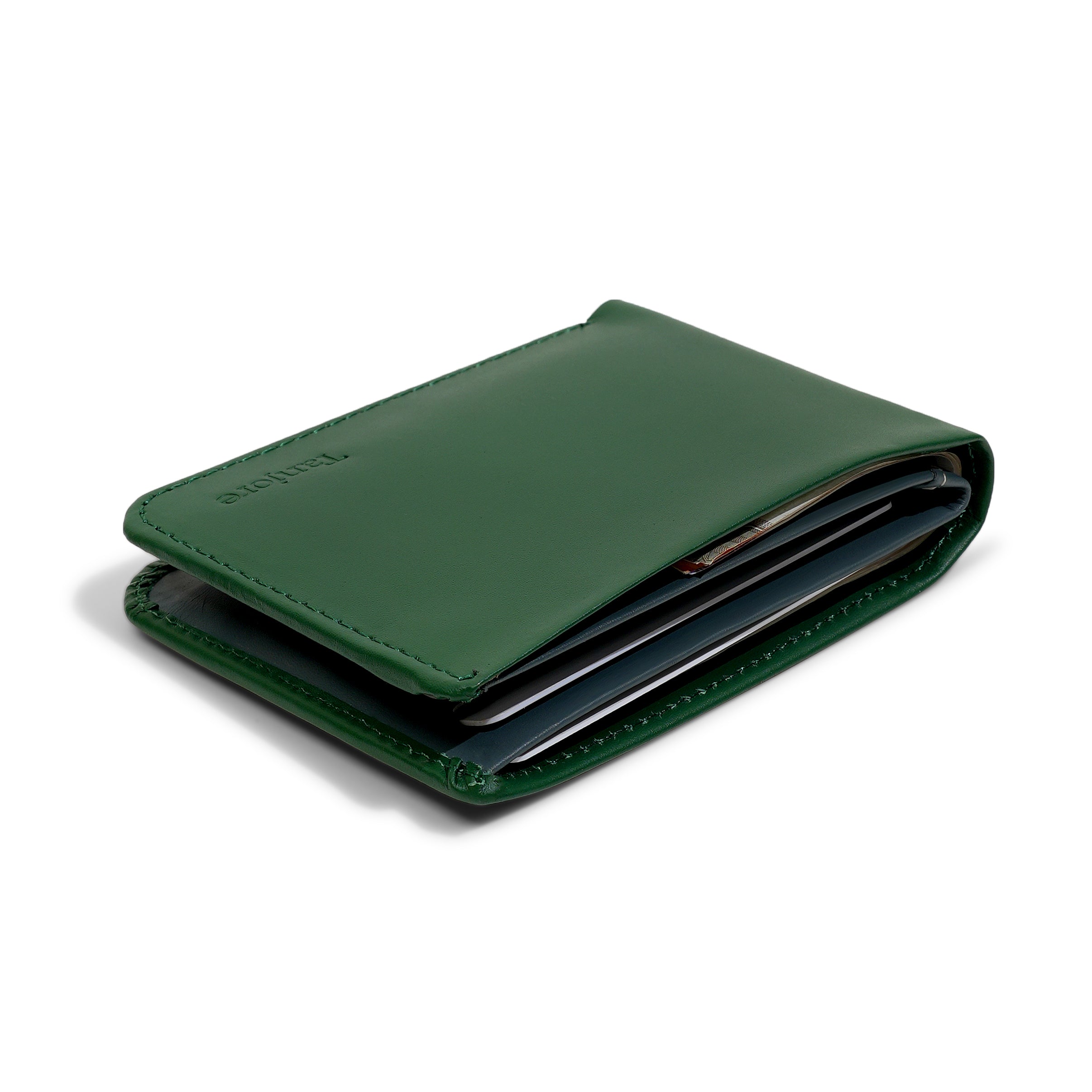Side profile of the Green Modern Classic 2.0 holding cash and cards. Engineered to remain a Slim Profile bifold while offering full RFID protection.