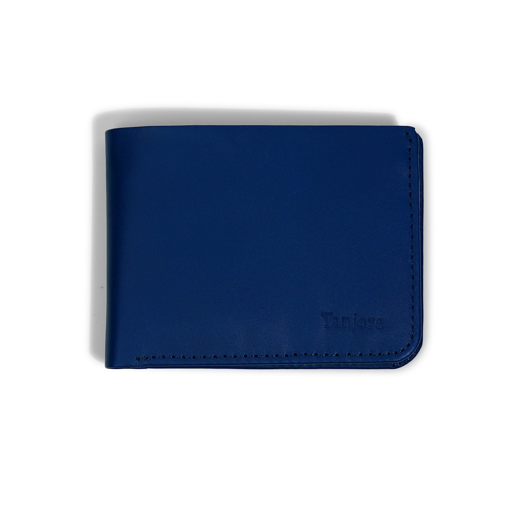 Front view of the Tanjore Modern Classic 2.0 in Navy Blue. A Slim Profile bifold wallet crafted from Full Grain Nappa Leather with RFID protection.