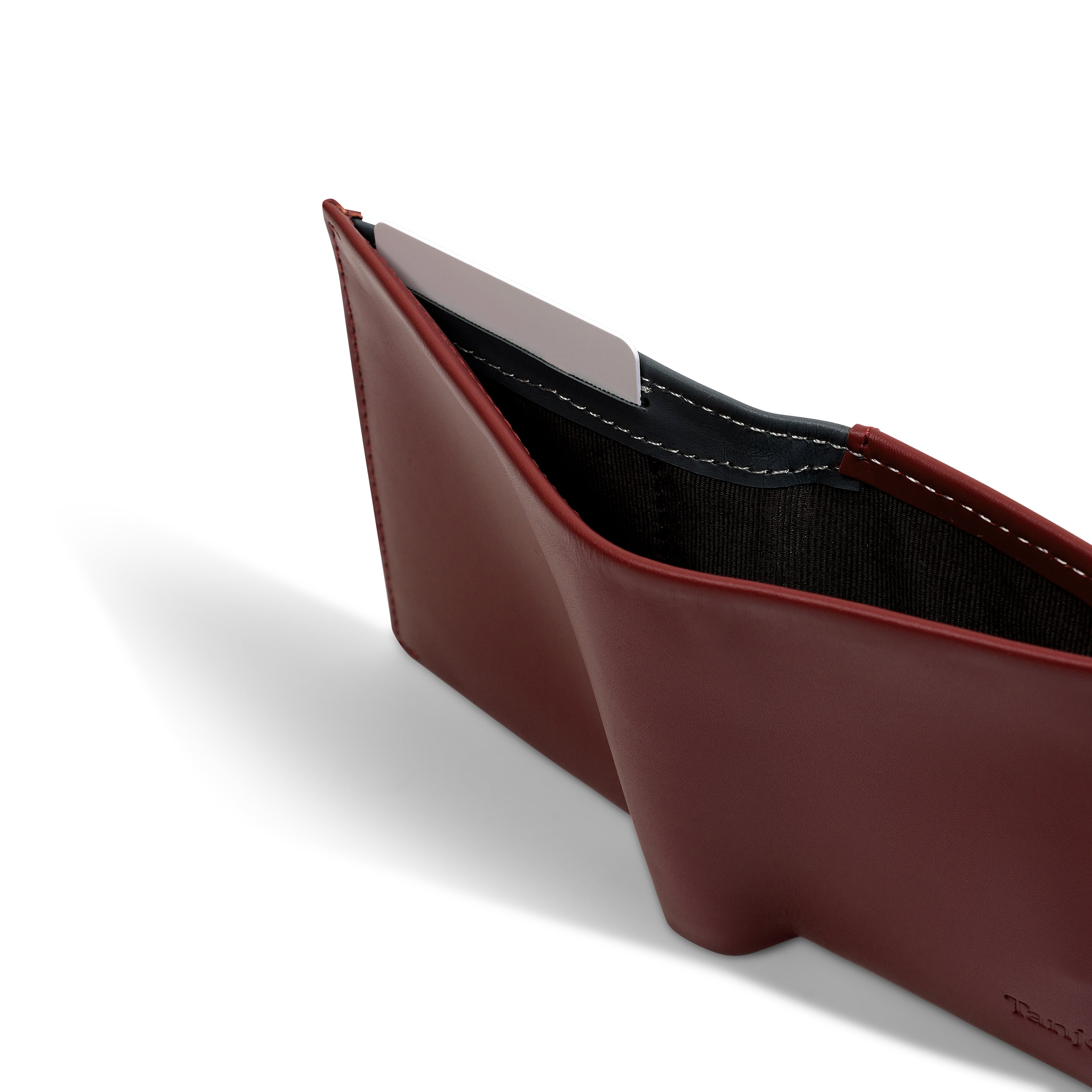 Top view into the Tanjore Reserve Sleeve showing the deep cash compartment. Designed with a Slim Profile and RFID shielding in Full Grain Nappa Leather.