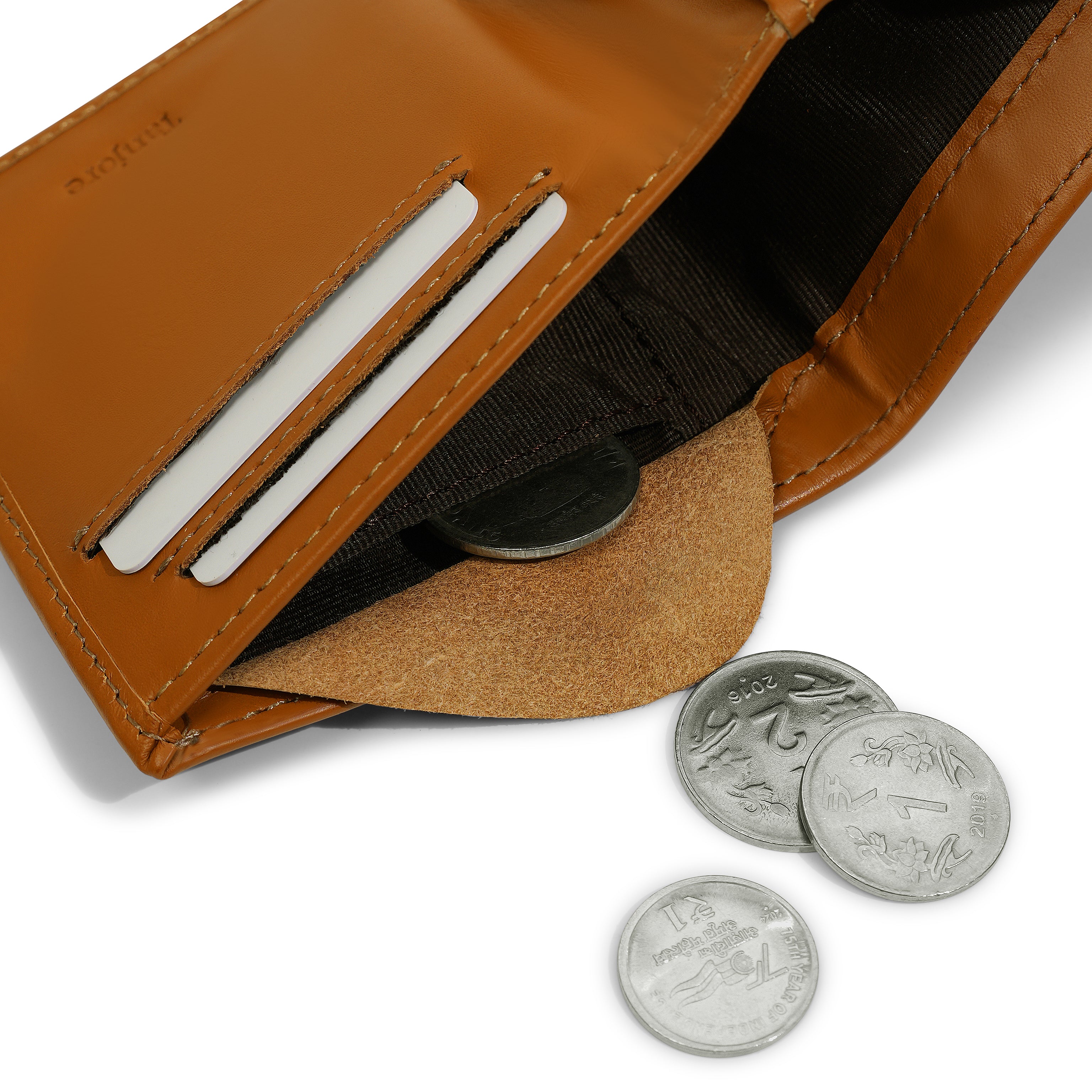 Close-up of the internal coin pocket in the Tanjore Reserve Sleeve in Tan. Functional Full Grain Nappa Leather design featuring RFID protection and a Slim Profile.