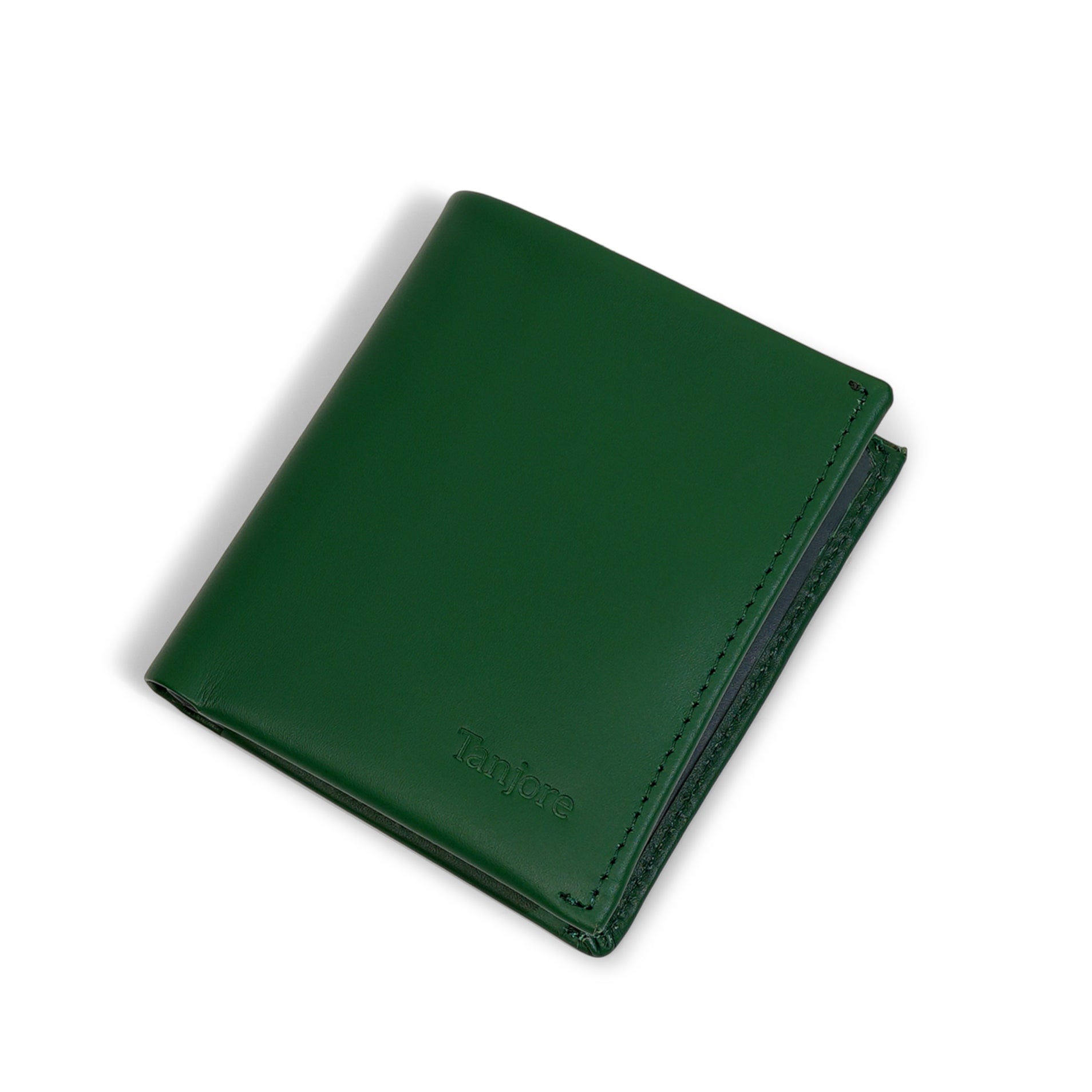 Angled perspective of the Reserve Sleeve in Green. Shows the sleek vertical design and Full Grain Nappa Leather texture backed by a 3 year warranty.