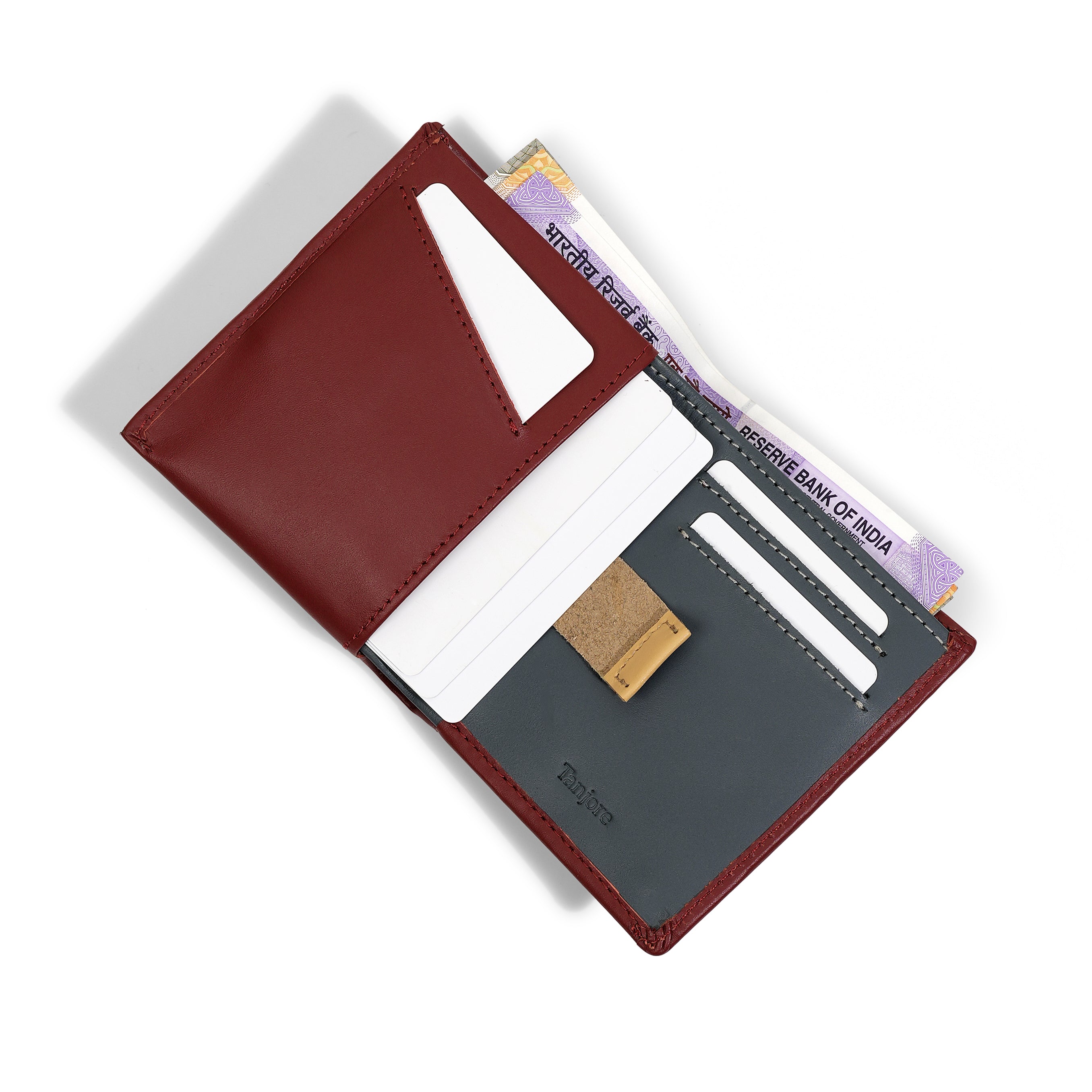 Interior open view of the Reserve Sleeve in Plum with a Grey interior. Features a contrasting Tan Pull Tab for easy card access, RFID protection, and Full Grain Nappa Leather construction.