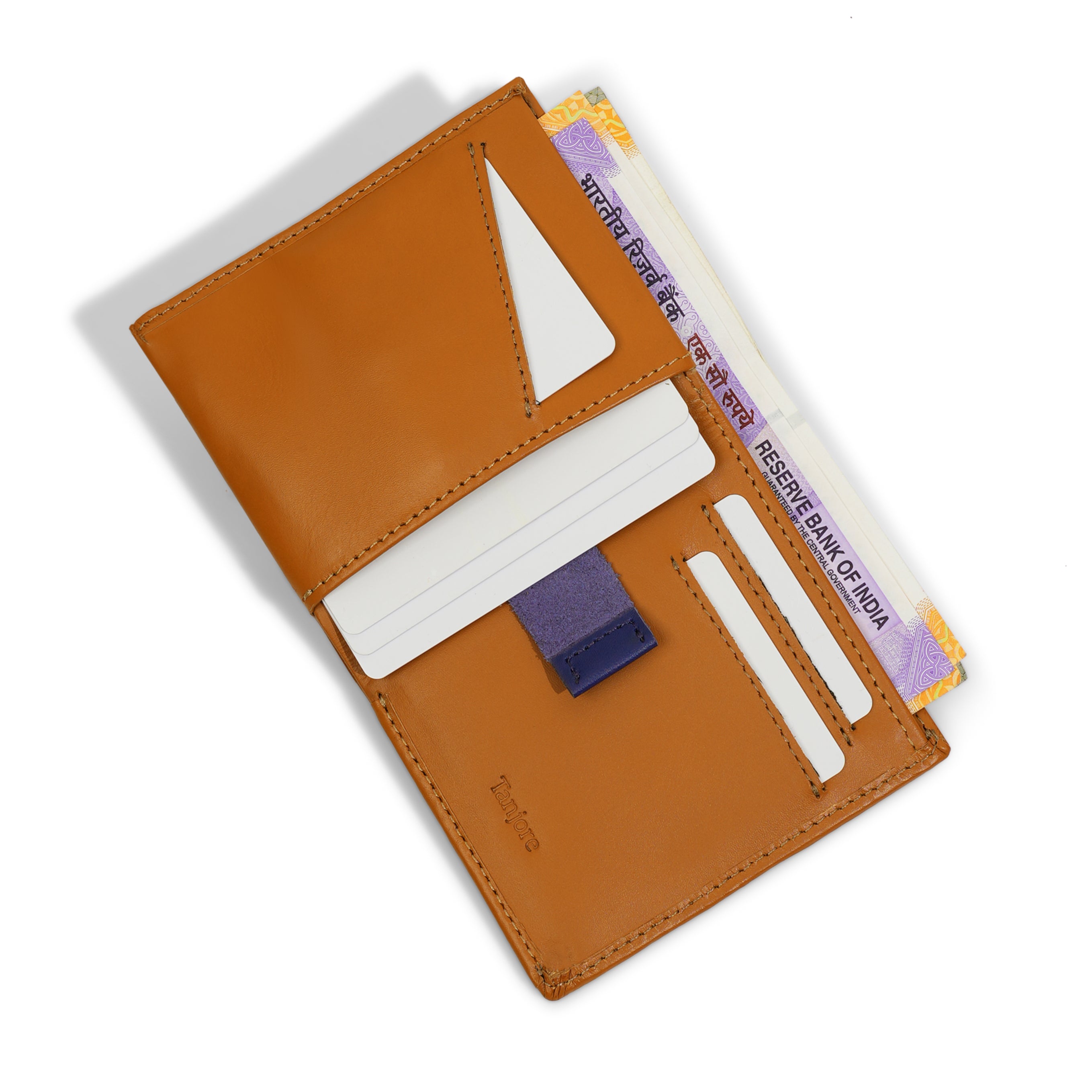 Interior open view of the Reserve Sleeve in Tan. Features a contrasting Blue Pull Tab for easy card access, RFID protection, and Full Grain Nappa Leather construction.