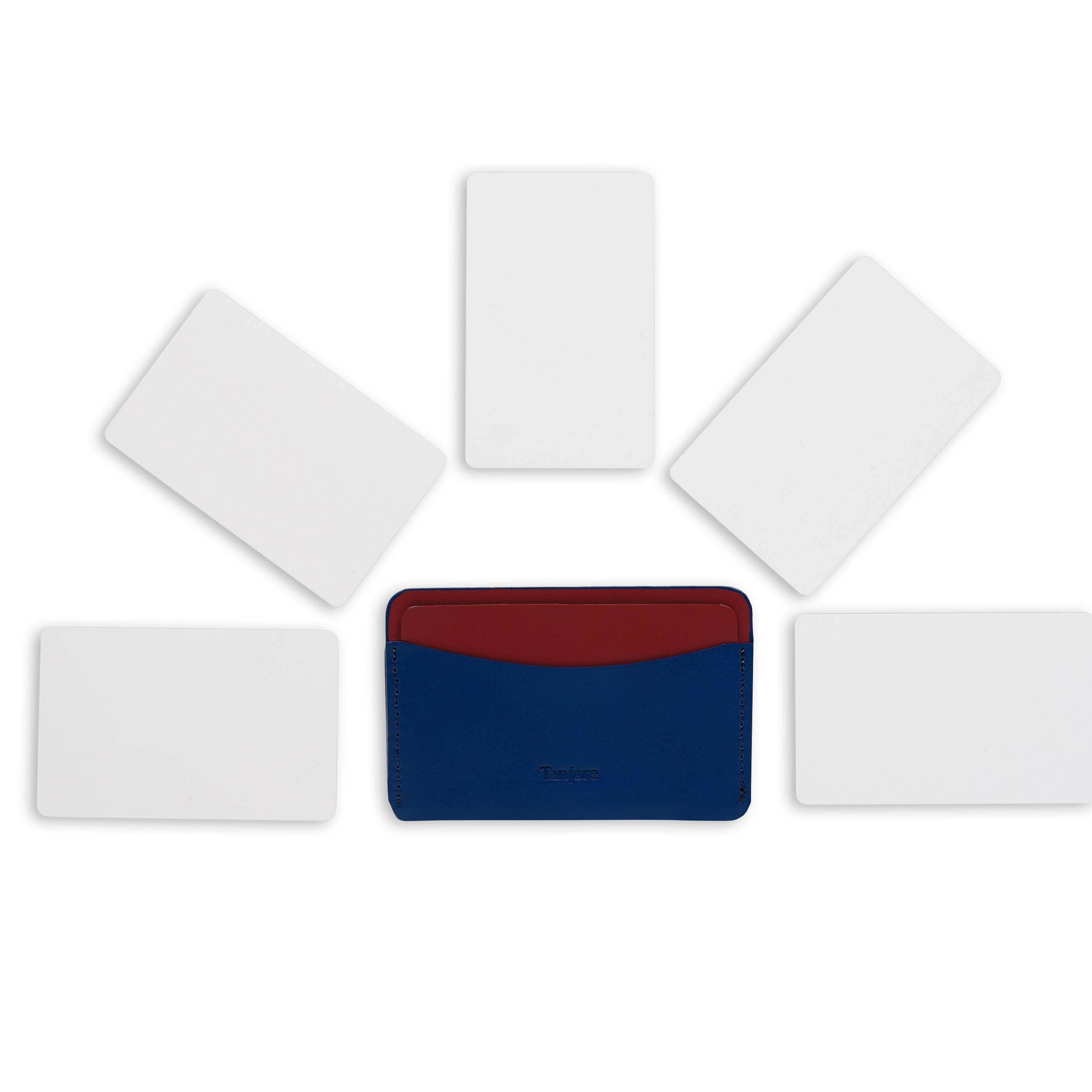 Top-down view of a Navy and Plum leather cardholder surrounded by five cards to demonstrate storage capacity. Compact Full Grain Nappa Leather design perfect for daily essentials.