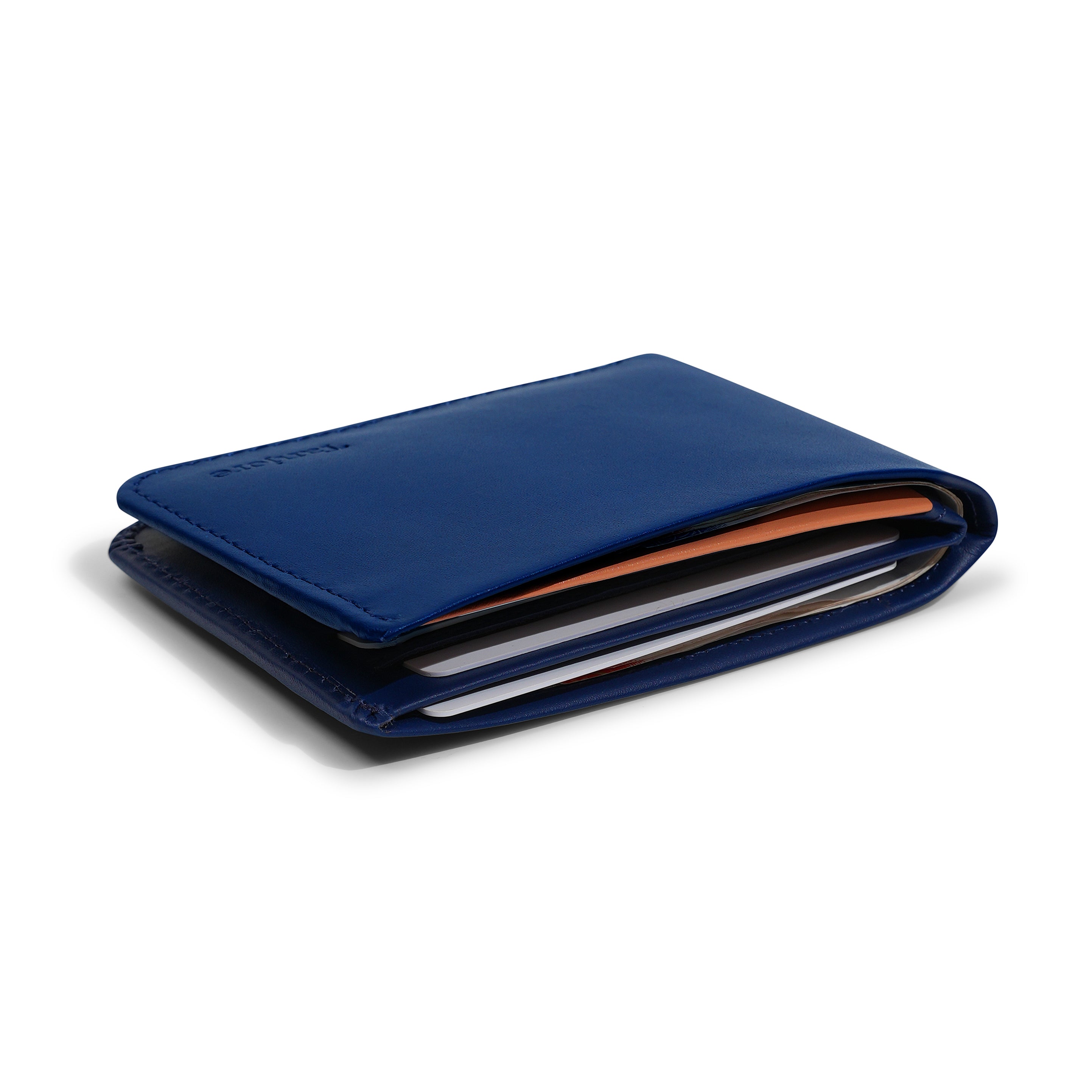 Side profile of the Navy Modern Classic 2.0 holding cash and cards. Engineered to remain a Slim Profile bifold while offering full RFID protection.
