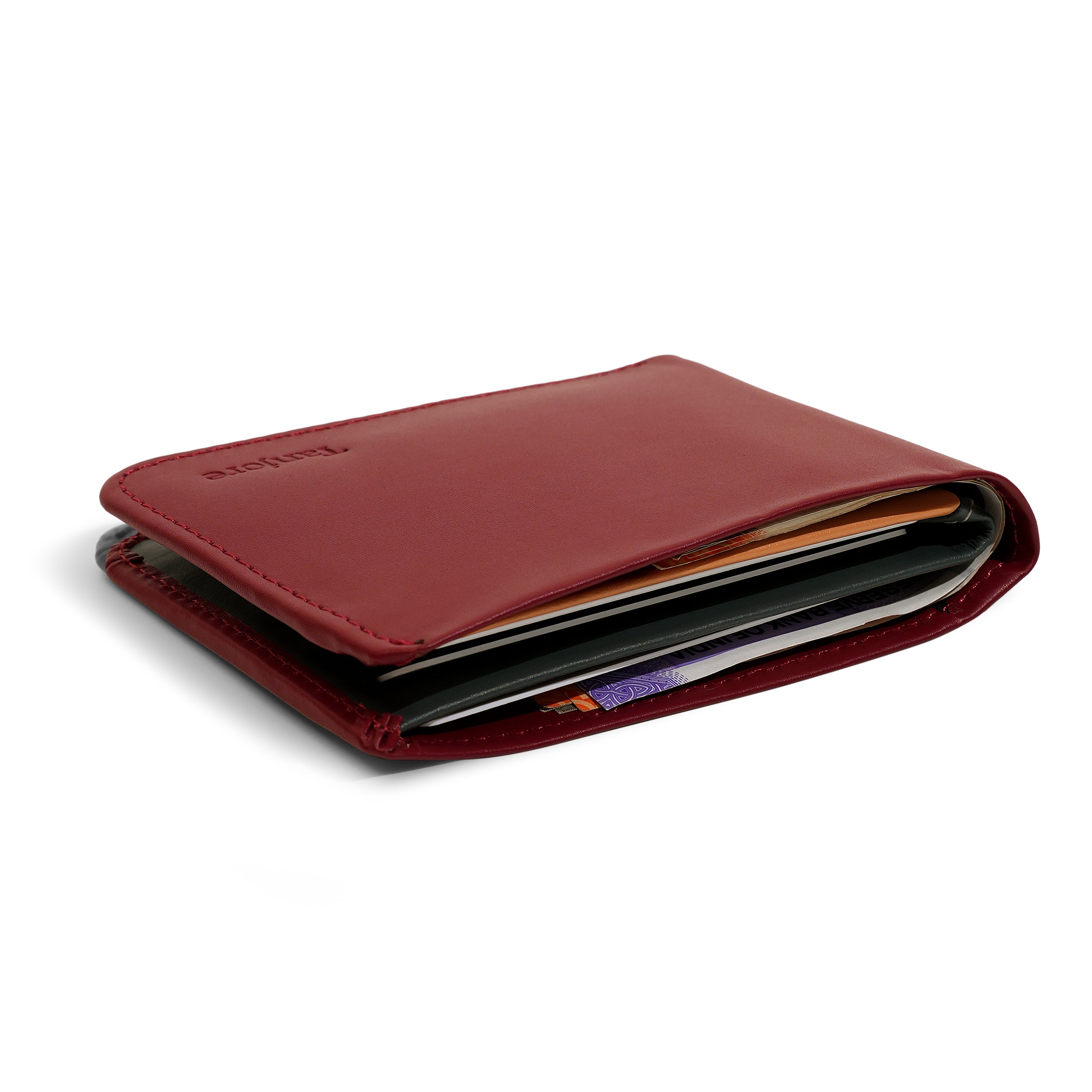 Side profile of the Modern Classic 2.0 holding cash and cards. Engineered to remain a Slim Profile bifold while offering full RFID protection.