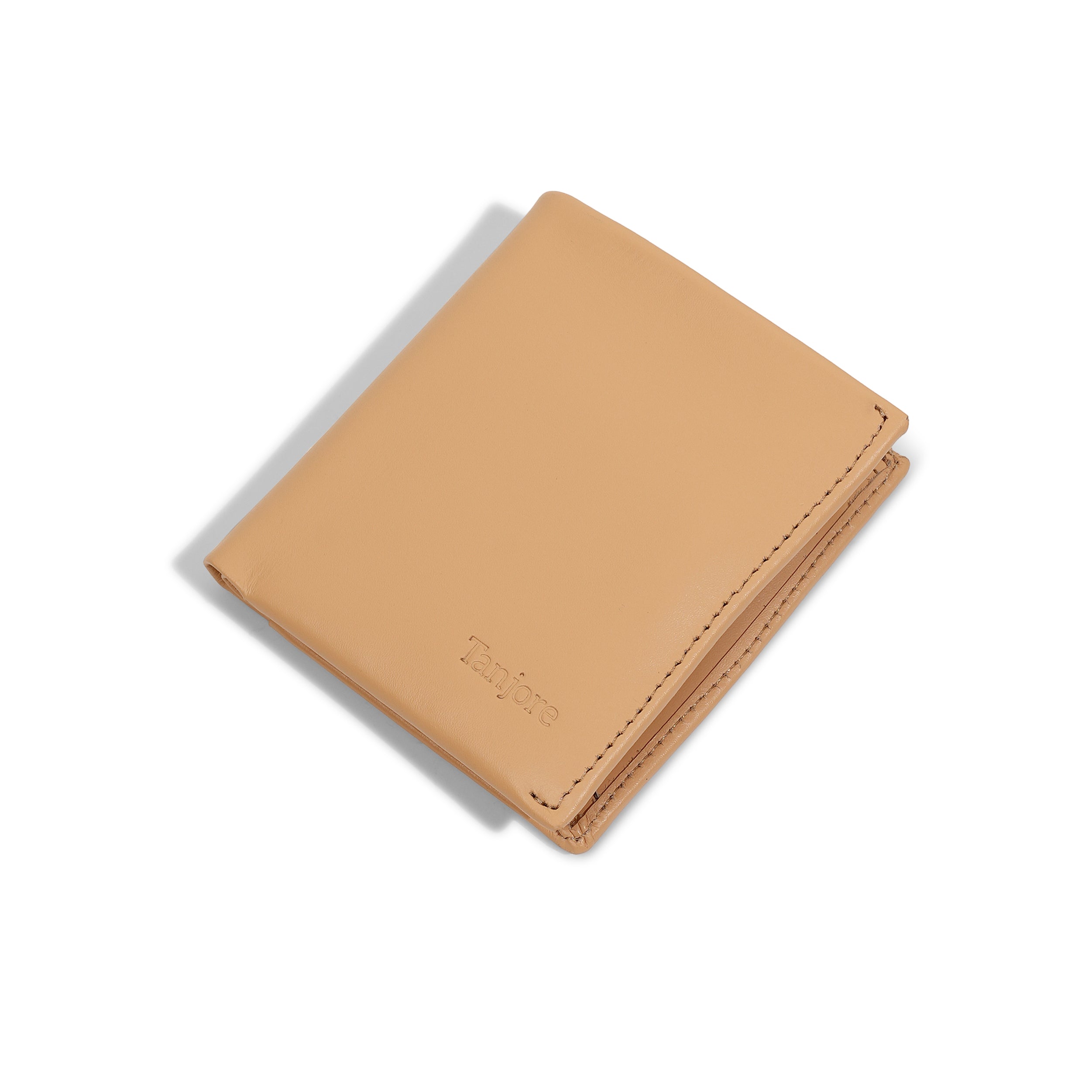 Angled perspective of the Reserve Sleeve in Clay. Shows the sleek vertical design and Full Grain Nappa Leather texture backed by a 3 year warranty.