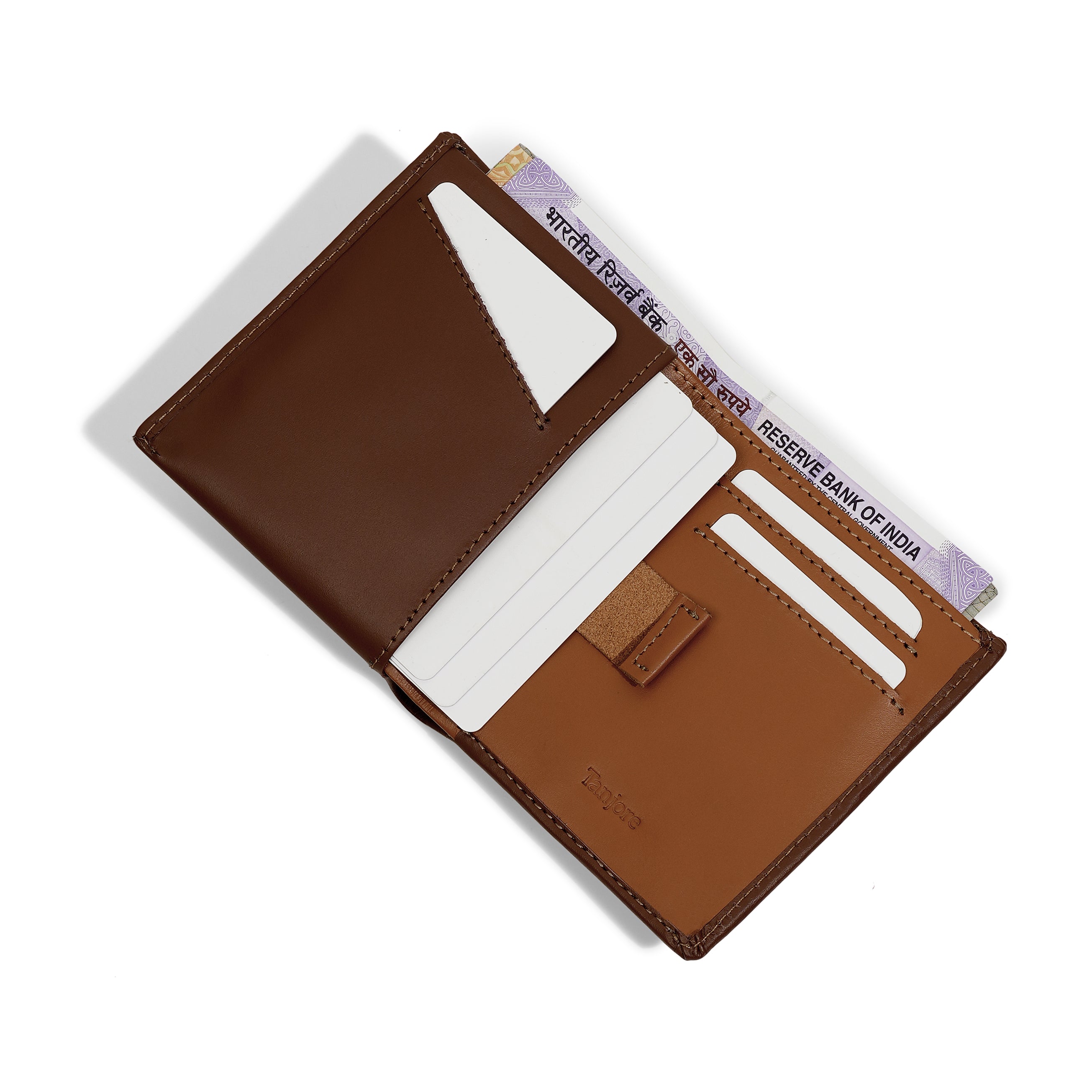 Interior open view of the Reserve Sleeve in Brown. Features a contrasting Tan Pull Tab for easy card access, RFID protection, and Full Grain Nappa Leather construction.
