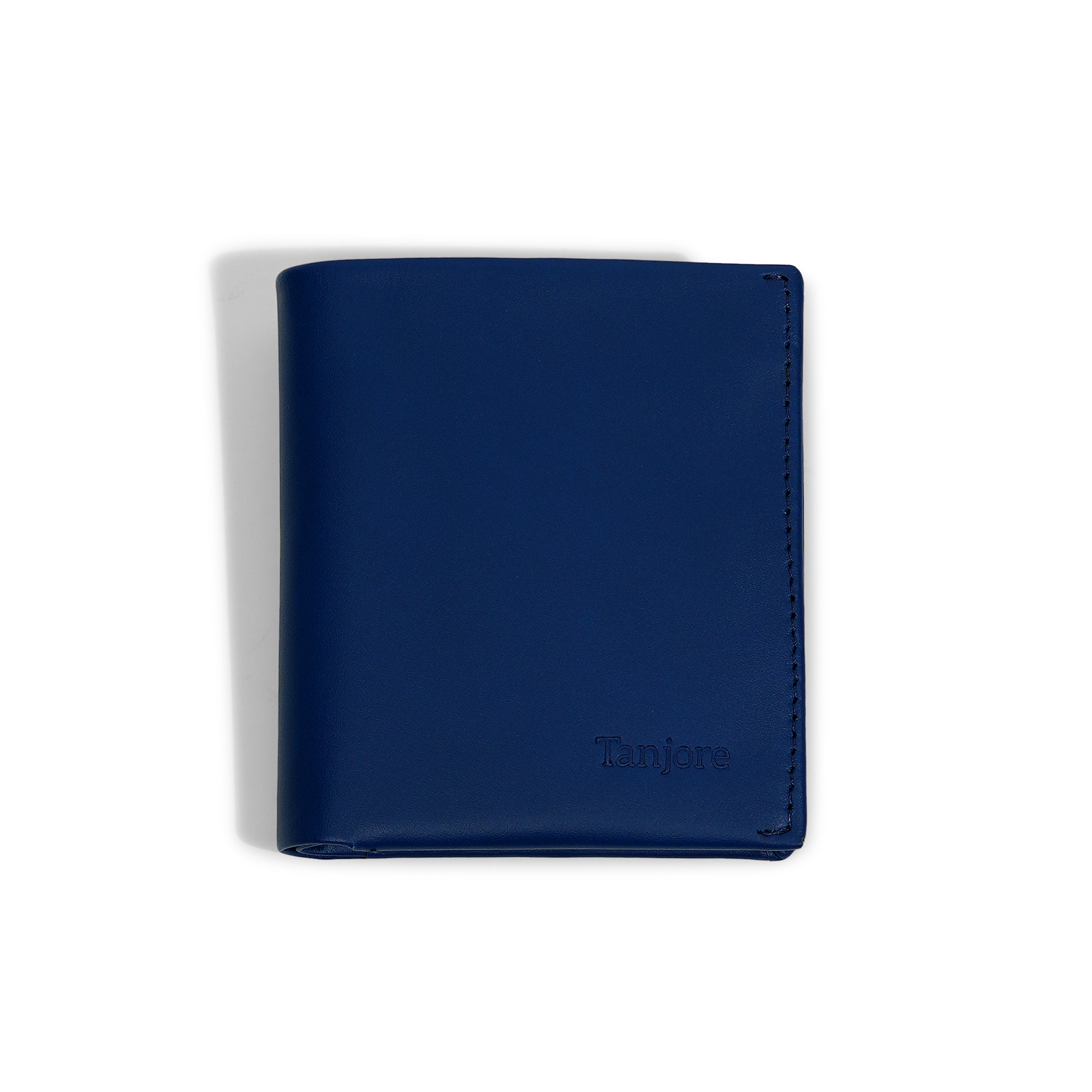 Front view of the Tanjore Reserve Sleeve in Navy. A Slim Profile wallet crafted from Full Grain Nappa Leather featuring RFID protection.