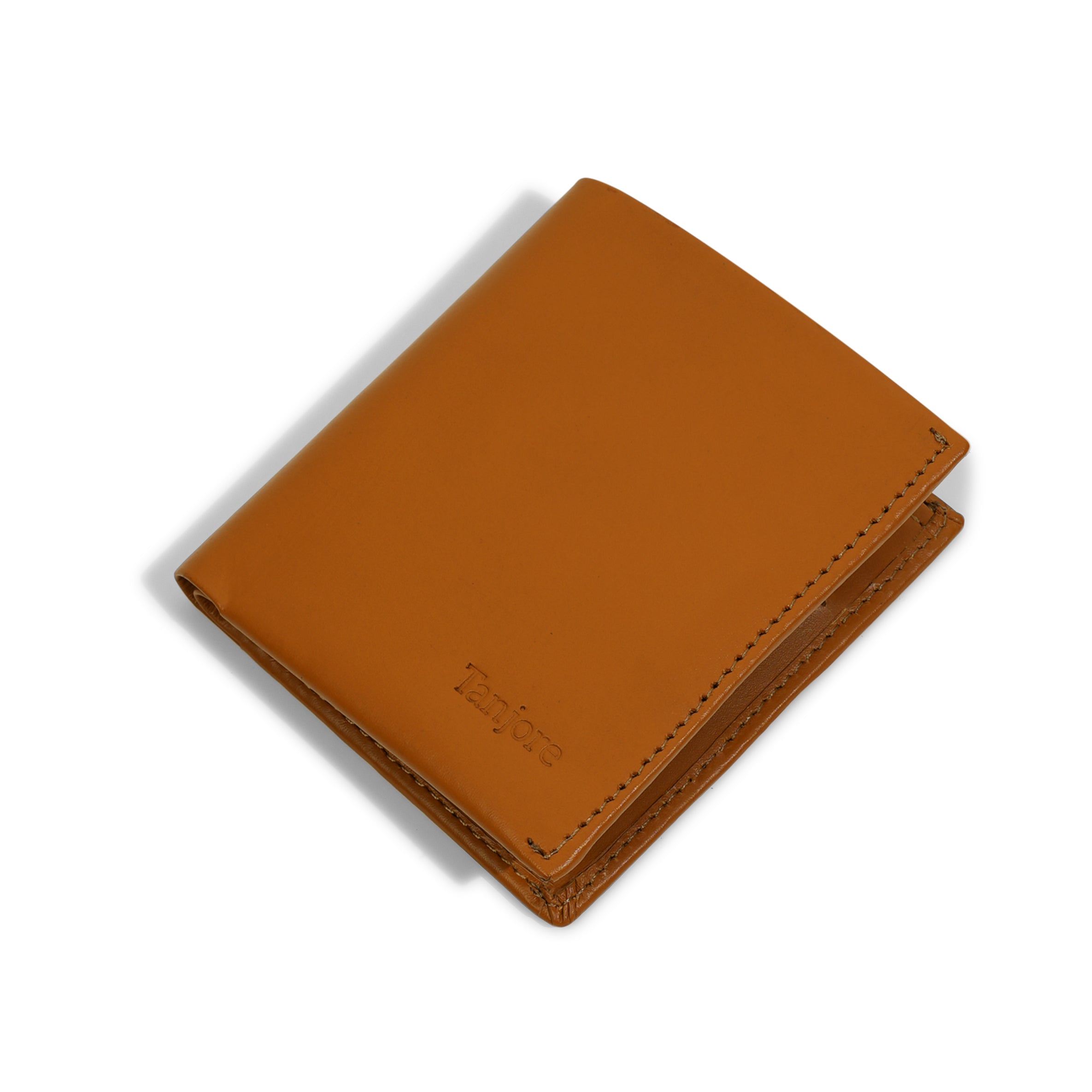 Angled perspective of the Reserve Sleeve in Tan. Shows the sleek vertical design and Full Grain Nappa Leather texture backed by a 3 year warranty.