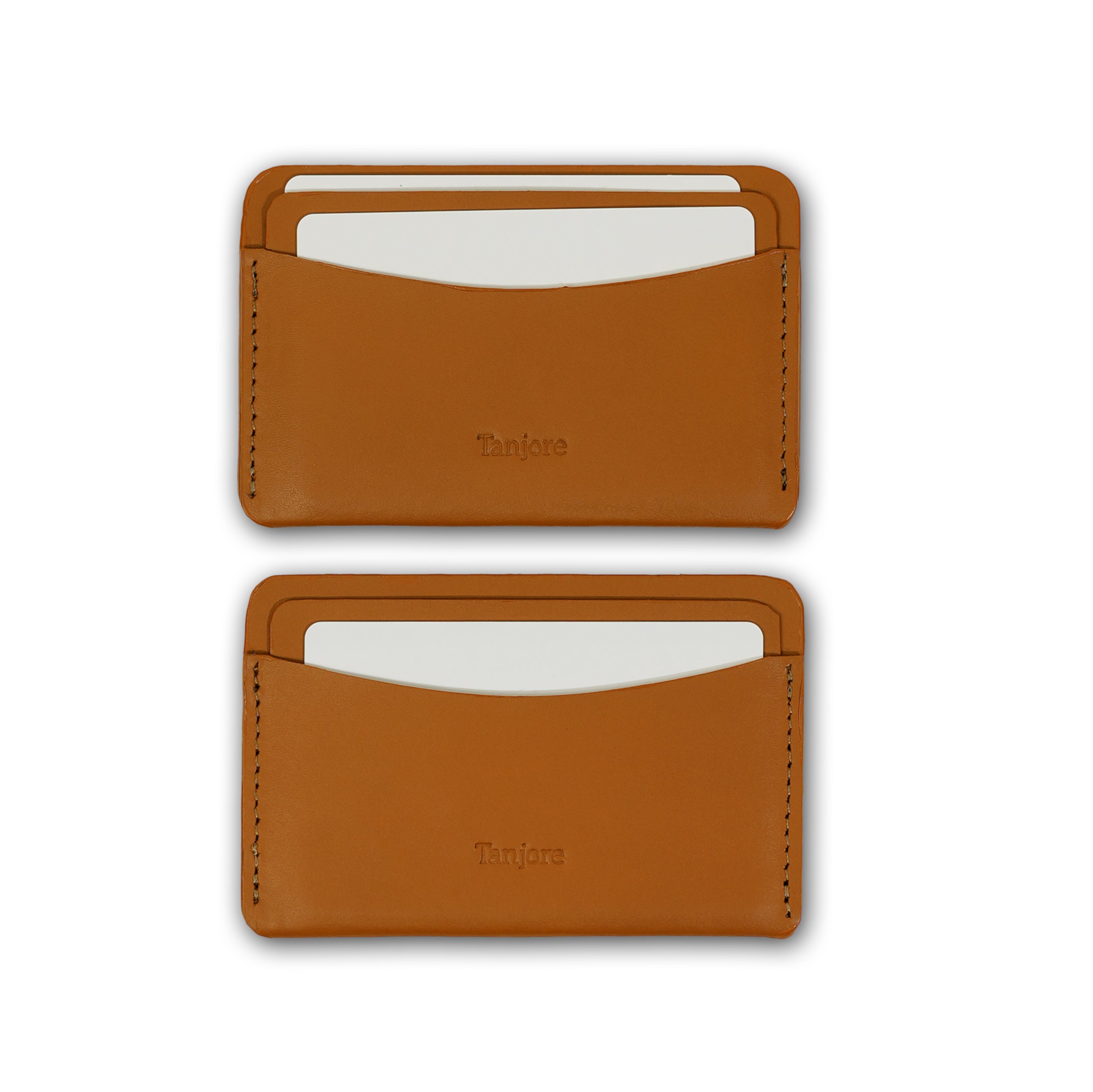 Two Tanjore wallets in Tan shown with credit cards inserted, highlighting the precision stitching and easy-access slots made of Full Grain Nappa Leather.